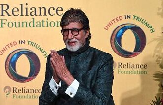 Bollywood actor Amitabh Bachchan attends the United in Triumph felicitation event hosted by the Reliance Foundation to honour the country's national cricket teams in Mumbai on January 5, 2026. (Photo by SUJIT JAISWAL / AFP)