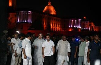 India's Congress party leader Rahul Gandhi (C) along with leaders of the opposition alliance INDIA bloc (Indian National Developmental Inclusive Alliance) gather outside the Presidential Palace as they demand the resignation of India's Chief Election Commissioner over alleged special intensive revision (SIR) voter-roll irregularities in New Delhi on October 9