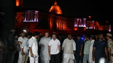 India's Congress party leader Rahul Gandhi (C) along with leaders of the opposition alliance INDIA bloc (Indian National Developmental Inclusive Alliance) gather outside the Presidential Palace as they demand the resignation of India's Chief Election Commissioner over alleged special intensive revision (SIR) voter-roll irregularities in New Delhi on October 9