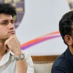 Abhijeet Dipke, right, founder of Cockroach Janta Party, and Saurav Das, party convener, address a press conference after a protest gathering demanding the resignation of the country's election chief Gyanesh Kumar, in Bengaluru, India, Thursday, Oct. 8, 2026. (AP Photo/Aijaz Rahi)
