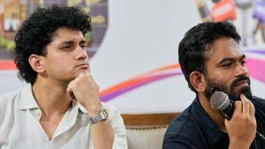 Abhijeet Dipke, right, founder of Cockroach Janta Party, and Saurav Das, party convener, address a press conference after a protest gathering demanding the resignation of the country's election chief Gyanesh Kumar, in Bengaluru, India, Thursday, Oct. 8, 2026. (AP Photo/Aijaz Rahi)