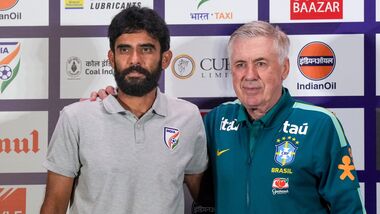 India head coach Khalid Jamil (L) with his Brazilian counterpart Carlo Ancelotti during a press conference ahead of the India and Brazil International Friendly.