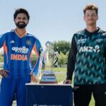 Indian captain Shreyas Iyer (L) and New Zealand captain Mitchell Santner pose with the trophy ahead of the first T20I.
