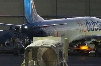 People disembark from a FlyDubai carrying Israeli passengers who had earlier been aboard another FlyDubai aircraft that made an emergency landing in Saudi Arabia approaches Ben Gurion International Airport near Tel Aviv, Israel, Wednesday, Sept. 30, 2026. (AP Photo/Ariel Schalit)