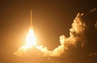 The H3 rocket carrying the Martian Moons Exploration (MMX) rover bound for Mars' moon Phobos lifts off from the Tanegashima Space Center in Minamitane, Kagoshima Prefecture, Japan, October 20, 2026 in this photo taken by Kyodo.