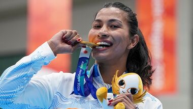 Gold medallist India's Lovlina Borgohain poses for photographers during the medal ceremony for the women's 75kg boxing event at the 20th Asian Games 2026.