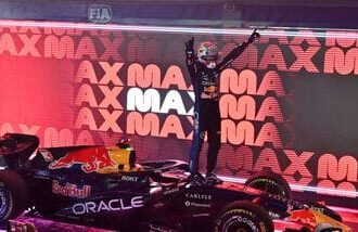 Red Bull's Max Verstappen celebrates after winning the Singapore Grand Prix
