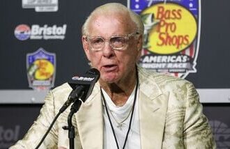 Professional wrestler Ric Flair speaks to the media before the Bass Pro Shops Night Race at Bristol Motor Speedway. (file photo)