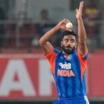 India's Naman Dhir bowls during the second T20I against West Indies.