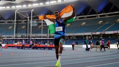 India's Nishad Kumar celebrates winning gold in the men's long jump T47 event at the 2026 Asian Para Games in Nagoya.