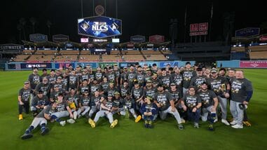 The Milwaukee Brewers pose for a team photo after Game 4 of baseball's National League Championship Series between the Milwaukee Brewers and the Los Angeles Dodgers.