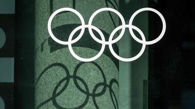 A photo taken on 27 August 2026 shows the Olympic rings at the entrance of the building of the Olympic Centre in Warsaw.