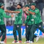 Pakistan's Muhammad Imran, center, celebrates with teammates after taking the wicket of Sri Lanka's Kamil Mishara during the first T20 cricket match between Pakistan and Sri Lanka.