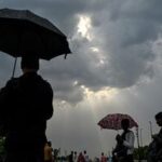 Rain clouds hover over the Kartavya Path in New Delhi