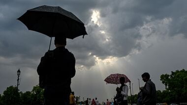 Rain clouds hover over the Kartavya Path in New Delhi