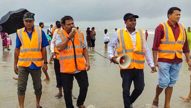 File Photo: Civil Defence personnel and other officials make public announcements on Sagar Island beach, advising people to stay away from the sea following the formation of a deep depression over the Bay of Bengal