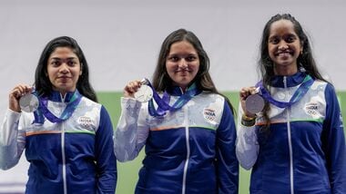Nagoya: From left, India's Vidarsa Vinod (Left), Sonam Maskar (Centre) and Elavenil Valarivan (Right) pose for photographers after winning silver medals in the 10m Air Rifle Women Team Final event during the 20th Asian Games, in Nagoya. .