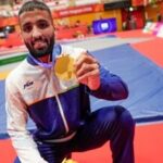 Nagoya: India's Sujeet Kalkal poses for photographs after winning gold medal in the men's Freestyle 65 kilogram final bout 196 wrestling event in the ongoing Asian Games 2026, in Nagoya, Japan.