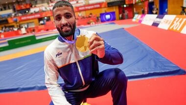 Nagoya: India's Sujeet Kalkal poses for photographs after winning gold medal in the men's Freestyle 65 kilogram final bout 196 wrestling event in the ongoing Asian Games 2026, in Nagoya, Japan.