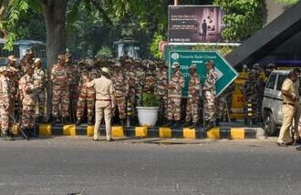 CJP Protest Live Updates: Police and security personnel stand guard ahead of the INDIA bloc's march to Rashtrapati Bhavan to seek President Droupadi Murmu's intervention over its demand for Chief Election Commissioner Gyanesh Kumar's resignation, at Janpath, in New Delhi, Friday, Oct. 9.
