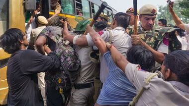 Police personnel detain demonstrators during a demonstration call by the Cockroach Janta Party (CJP) demanding the resignation of Chief Election Commissioner (CEC) Gyanesh Kumar over alleged electoral roll irregularities, in New Delhi, Saturday, Oct. 10, 2026. (PTI Photo/Karma Bhutia)