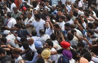 New Delhi: Congress leader Rahul Gandhi greets and moves along with supporters during 'March for Democracy' by INDIA bloc leaders, towards the Supreme Court, to file a petition against Chief Election Commissioner Gyanesh Kumar and 'vote chori', in New Delhi, Monday, Oct. 12, 2026