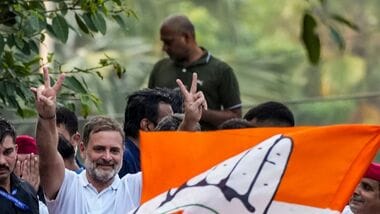 New Delhi: Congress leader Rahul Gandhi and other INDIA bloc leaders proceed in a vehicle towards the Supreme Court to file a petition against Special Intensive Revision (SIR) of electoral rolls and alleged poll irregularities during 'March for Democracy', in New Delhi, Monday, Oct. 12, 2026. NSUI President Vinod Jakhar is also seen. (PTI Photo/Arun Sharma) (PTI10_12_2026_000412A)