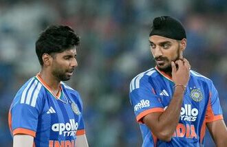 Hyderabad: India's Mayank Yadav, left, and Arshdeep Singh interact between overs during the fourth T20I cricket match of a series between India and West Indies, in Hyderabad, Telangana, Wednesday, Oct. 14, 2026. (PTI Photo/Shailendra Bhojak) (PTI10_14_2026_000344B)