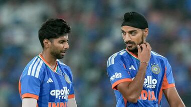 Hyderabad: India's Mayank Yadav, left, and Arshdeep Singh interact between overs during the fourth T20I cricket match of a series between India and West Indies, in Hyderabad, Telangana, Wednesday, Oct. 14, 2026. (PTI Photo/Shailendra Bhojak) (PTI10_14_2026_000344B)