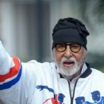 Bollywood actor Amitabh Bachchan greets fans at his residence Jalsa