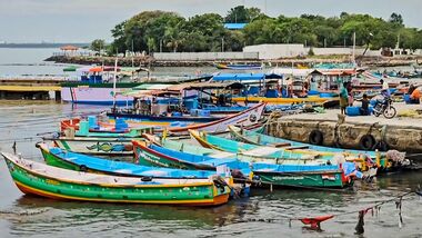 Fishing boats remain anchored at a fishing harbour following a cyclone alert, in Thoothukudi, Tamil Nadu, Monday, Oct. 26, 2026.