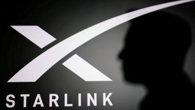The silhouette of Elon Musk and Starlink logo are seen in this illustration taken June 11, 2026.