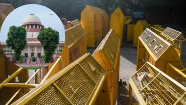 police barricades stacked along Jantar Mantar Road as part of security arrangements ahead of a proposed protest call by the Cockroach Janta Party (CJP). (Inset: Supreme Court of India File Photo).