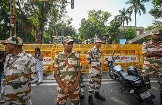Security personnel are seen deployed in large numbers near Jantar Mantar, as roads leading to the protest site remain closed and barricaded amid heightened security arrangements ahead of a protest called by the Cockroach Janta Party (CJP) in New Delhi, on Friday, October 9, 2026. (Photo by Sanchit Khanna/ Hindustan Times)