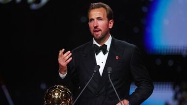 Bayern Munich's Harry Kane makes a speech after winning the men's Ballon d'Or award.