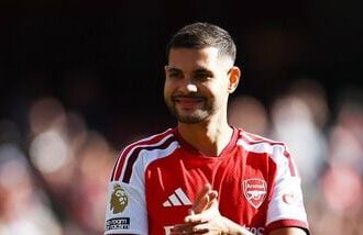 Arsenal's Bruno Guimaraes celebrates after the match.