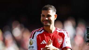 Arsenal's Bruno Guimaraes celebrates after the match.