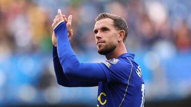 Chelsea's Jordan Henderson applauds fans after the match