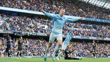 Manchester City's Erling Haaland celebrates scoring their third goal.
