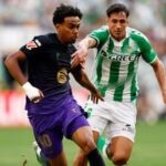 FC Barcelona's Lamine Yamal in action with Real Betis' Facundo Bernal