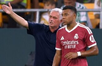 Real Madrid coach Jose Mourinho gives instructions to Real Madrid's Kylian Mbappe during a match (file photo)