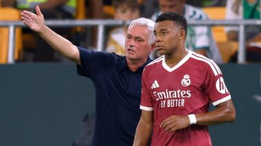 Real Madrid coach Jose Mourinho gives instructions to Real Madrid's Kylian Mbappe during a match (file photo)
