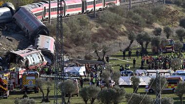 Emergency services work at the site of a train crash between two high-speed units, a Renfe AVE train and an Iryo train around 150 km south of Madrid between Urda and Los Yebenes in the province of Toledo, on October 28, 2026. A high-speed train collision south of Madrid killed 68 people and injured scores more today, with the toll likely to rise, authorities said, in one of Europe's deadliest such disasters this century. The second such accident to strike Spain this year will raise fresh questions about the country's rail safety, with the transport minister speaking of an 'error' and 'inexplicable circumstances' that led to the collision.