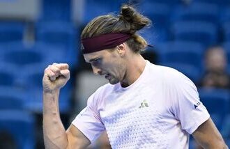 Germany's Alexander Zverev reacts during the men's singles tennis match  at the China Open tennis tournament in Beijing.