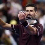 Novak Djokovic celebrates after winning his quarterfinal match against Germany's Alexander Zverev