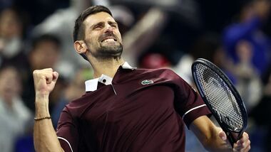 Novak Djokovic celebrates winning his round of 16 match against Bu Yunchaokete