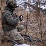 FILE PHOTO: A Ukrainian serviceman of 47th brigade prepares a Starlink satellite internet systems at his positions at a front line, amid Russia's attack on Ukraine, near the town of Avdiivka, recently captured by Russian troops in Donetsk region, Ukraine February 20, 2024. REUTERS/Inna Varenytsia/File Photo