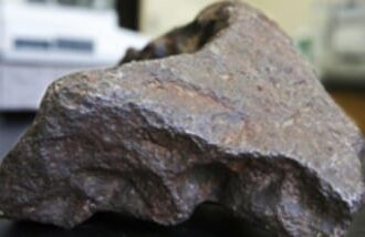 10 kg Edmore, Michigan, IIIAB iron meteorite as submitted to Central Michigan University for identification.