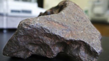 10 kg Edmore, Michigan, IIIAB iron meteorite as submitted to Central Michigan University for identification.